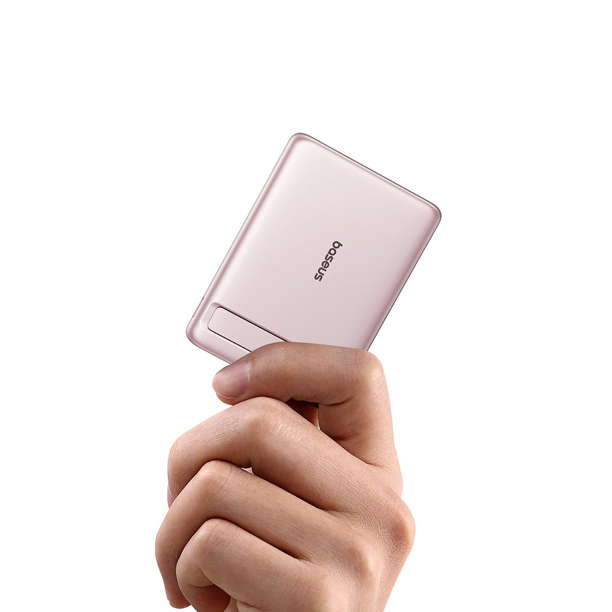 Hand holding a pink power bank with a brand logo on a white background