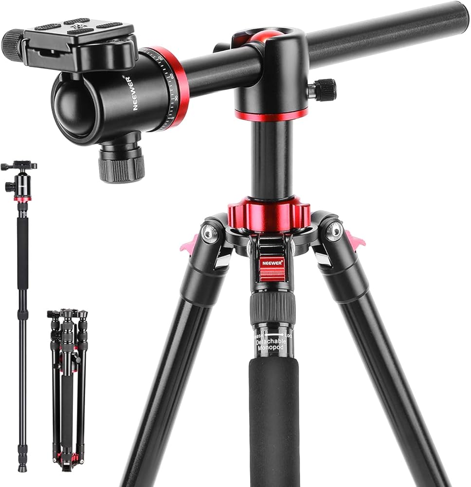 Camera tripod with red accents on a white background