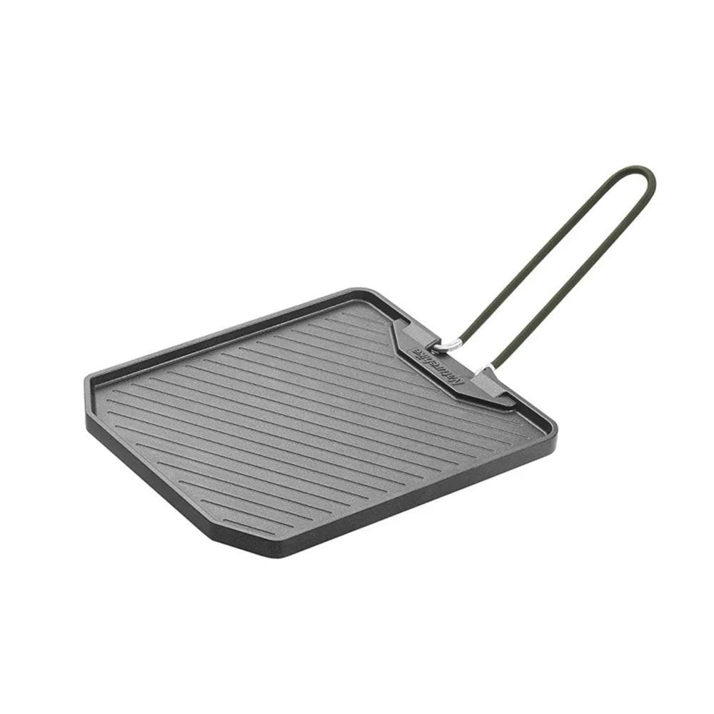 Grill pan with handle on a white background