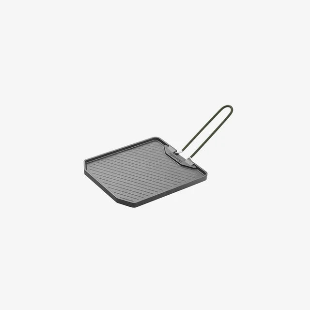 Small grill pan with handle on a white background