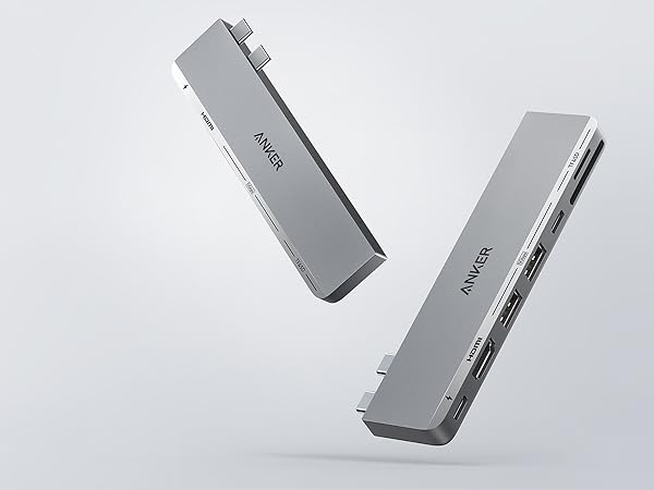 Two Anker USB hubs on a light gray background