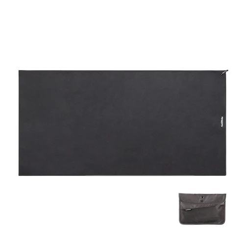 Black travel mat with a smaller black pouch on a white background