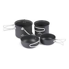Set of black cookware pots and pans on a white background
