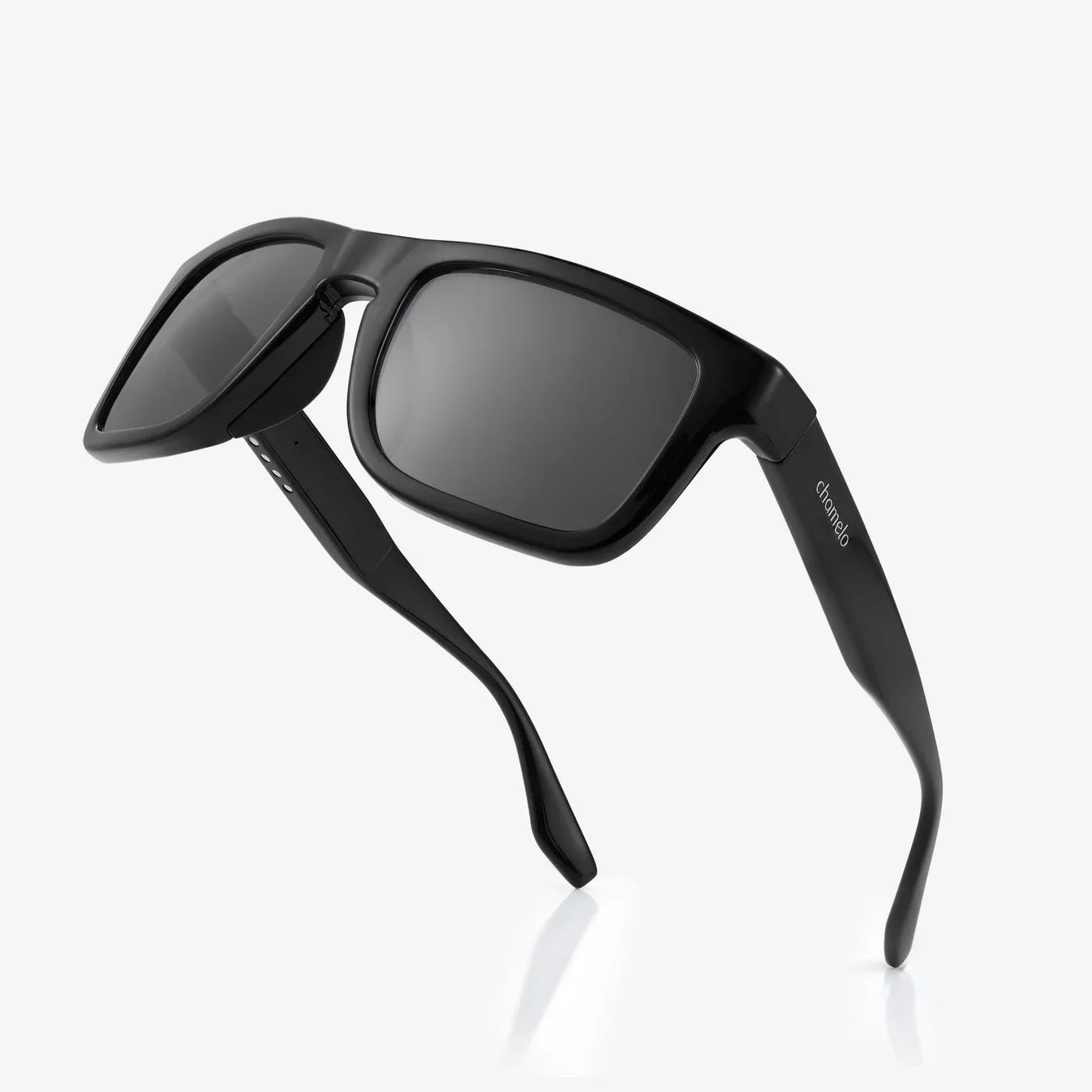 Black sunglasses with dark lenses on a white background