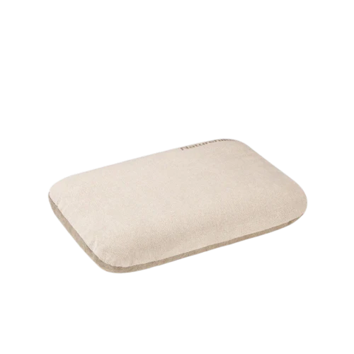 Beige rectangular cushion on a white background