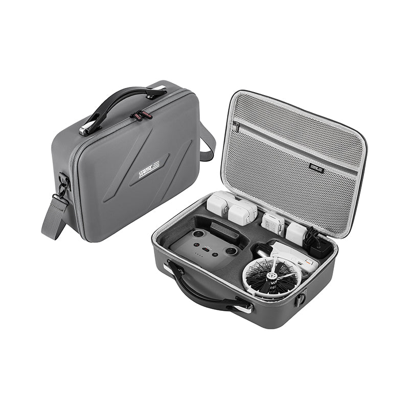 Gray carrying case with a small electronic device inside on a white background