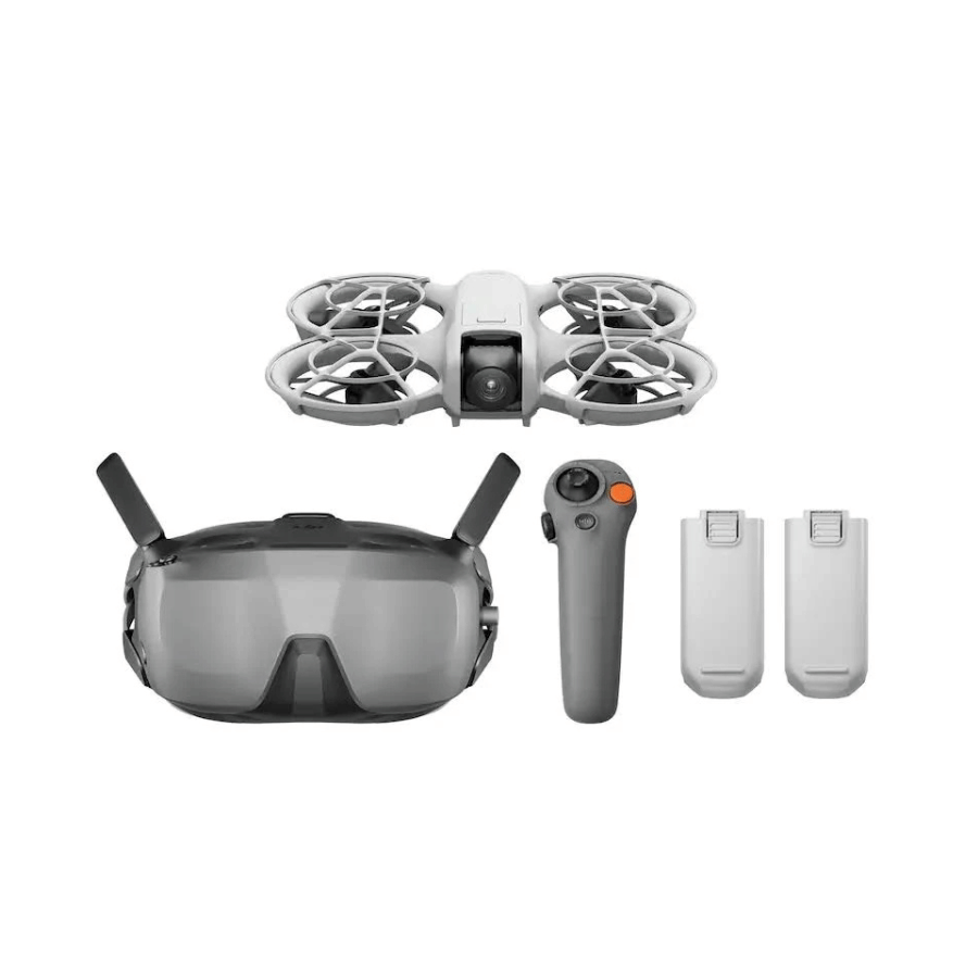 Drone, goggles, remote control, and batteries on a white background
