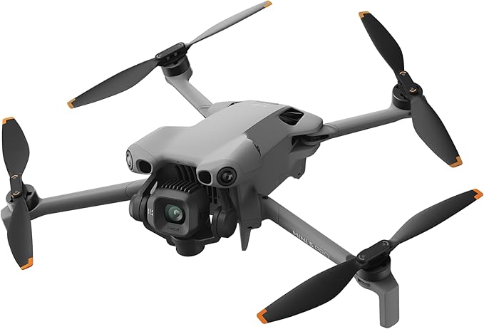 Gray drone with four propellers on a white background
