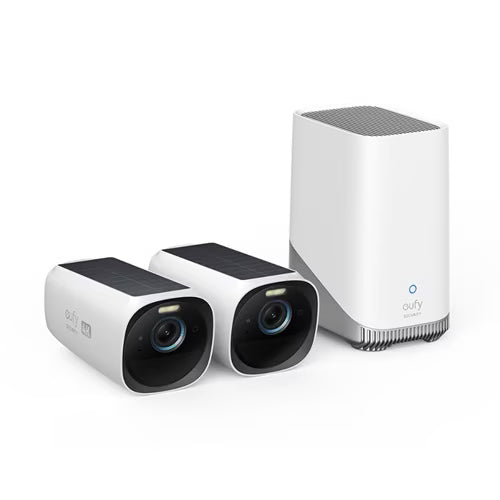 Two security cameras and a router on a white background