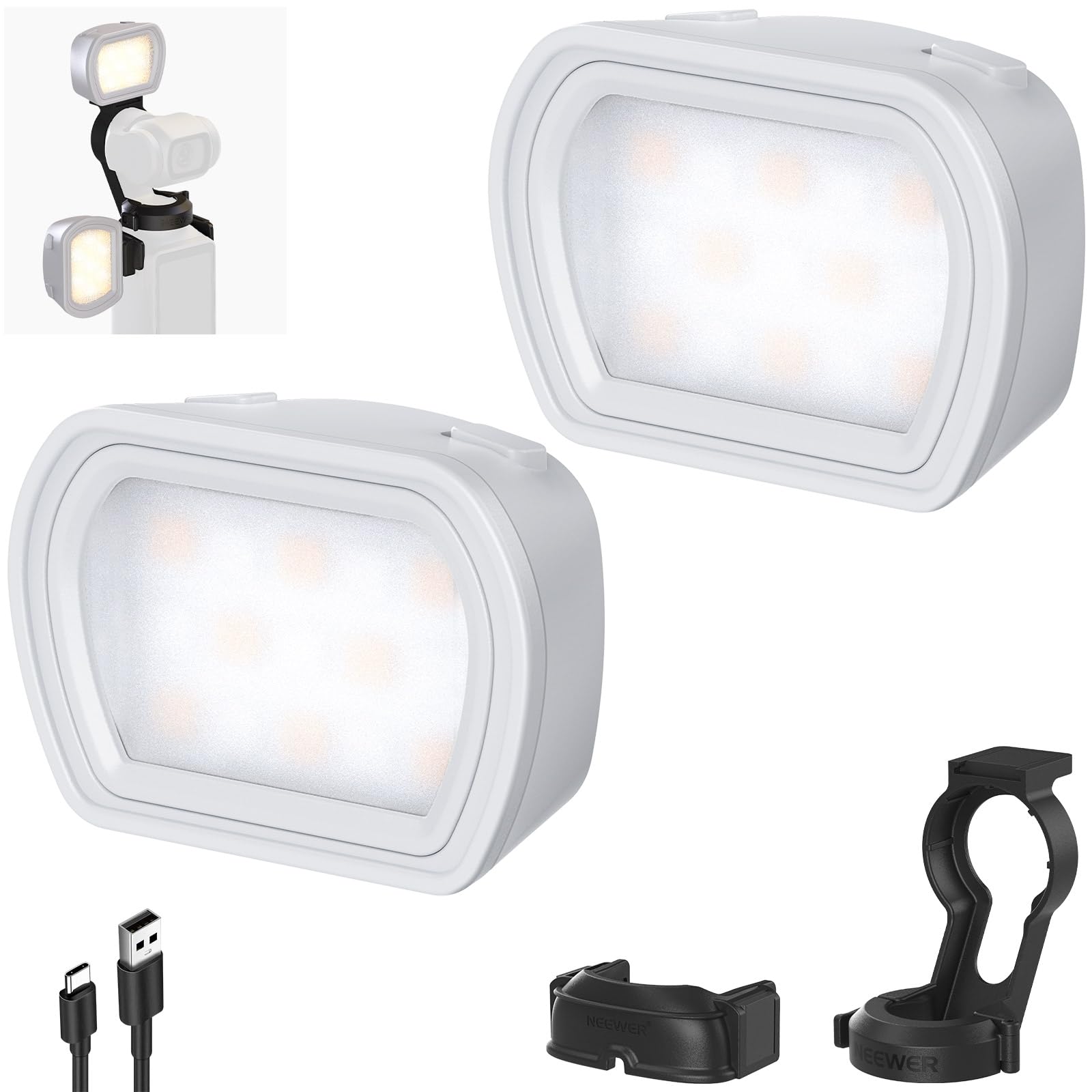 Two white LED motion sensor lights with a USB cable and mounting bracket on a white background.