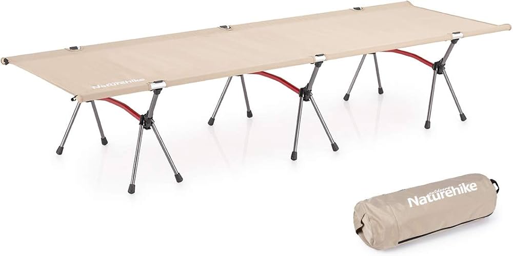 Beige camping cot with metal legs and a rolled-up Naturehike mat on a white background