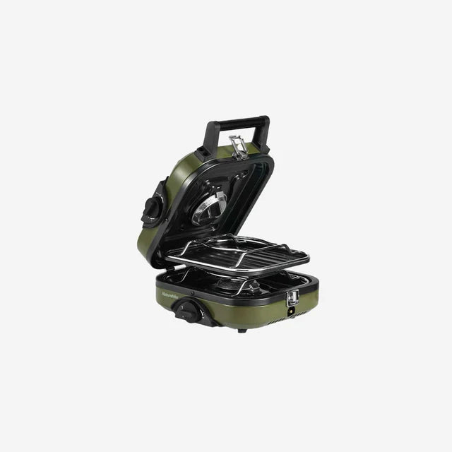 Green portable stove with a black handle on a white background