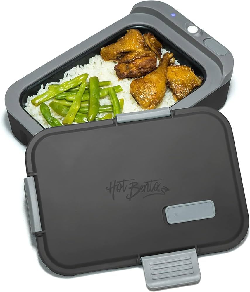 Hot Bento lunch box with food inside on a white background