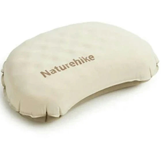 Beige inflatable pillow with 'Naturehike' branding on a white background