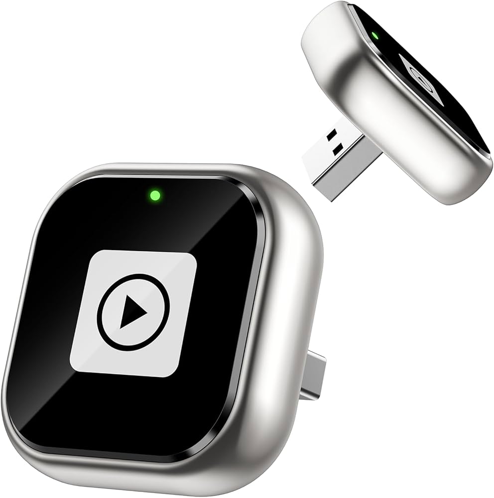 Black electronic device with play symbol and USB connector on a white background