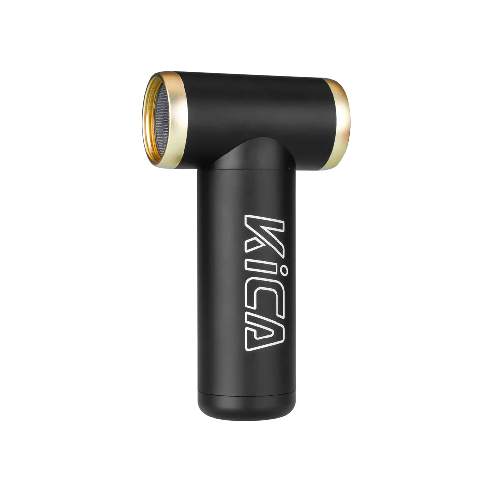 Black handheld device with gold accents on a white background