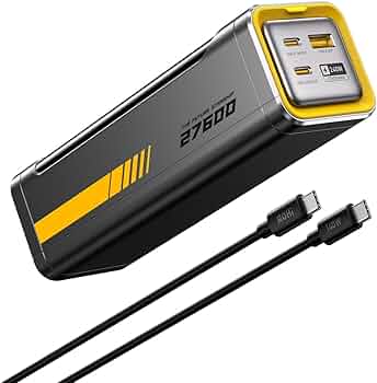 Black and yellow power bank with USB cable on a white background