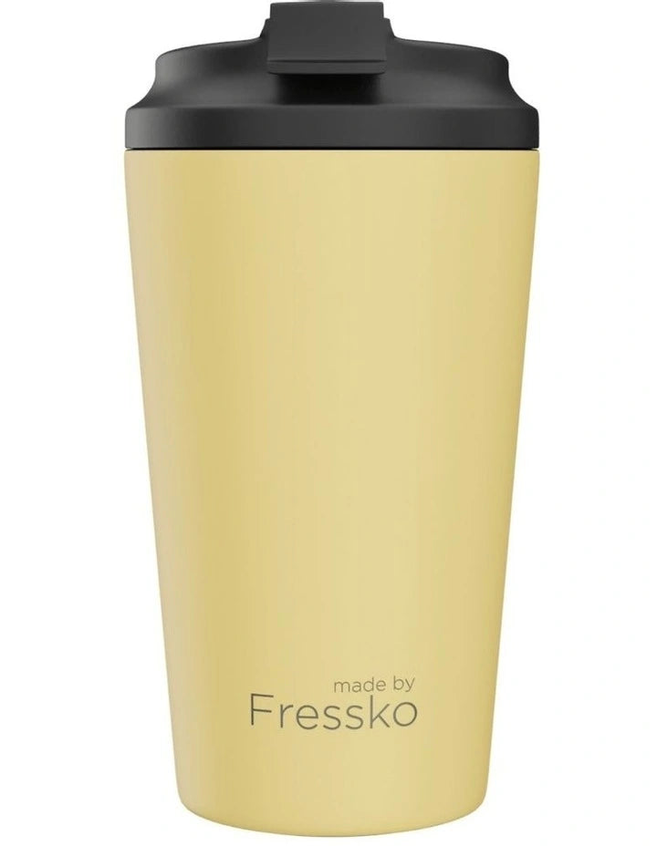 Yellow tumbler with black lid on a white background, branded 'made by Fressko'.