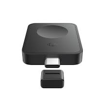 Black electronic device with a smaller component on a white background