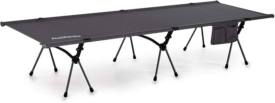 Portable folding table with 'Huttopia' branding on a white background