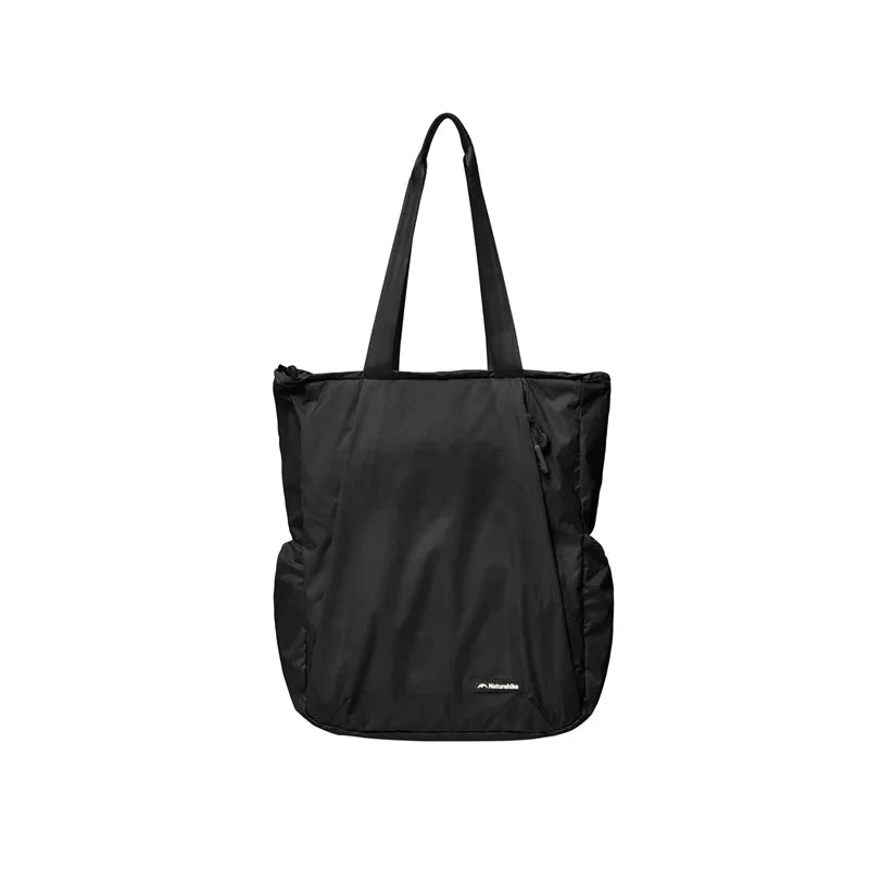 Black tote bag on a white background