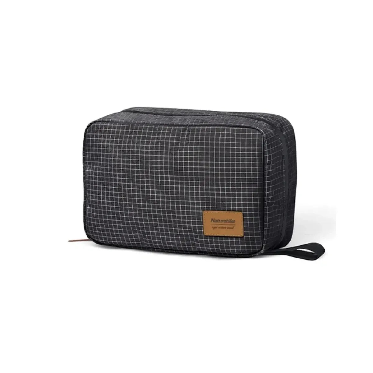 Black grid-patterned toiletry bag with a brown leather patch on a white background