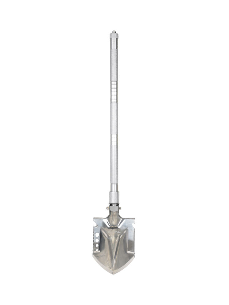 Metal folding shovel on a white background