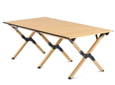 Portable folding table with wooden surface on a white background