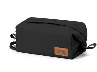 Black toiletry bag with a leather patch on a white background
