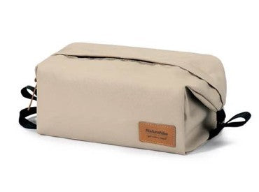 Beige toiletry bag with a leather patch on a white background