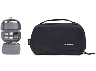 Black travel toiletry bag with gray interior organizer on a white background