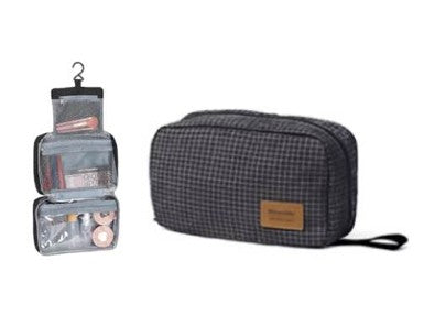 Gray toiletry bag with open compartments on a white background
