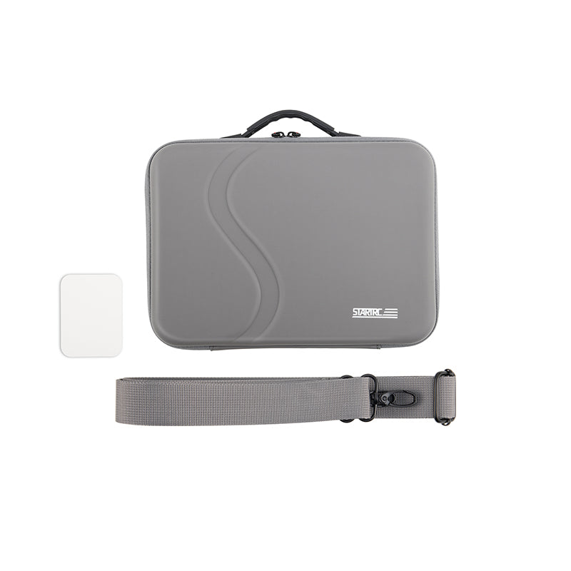Gray carrying case with a strap on a white background