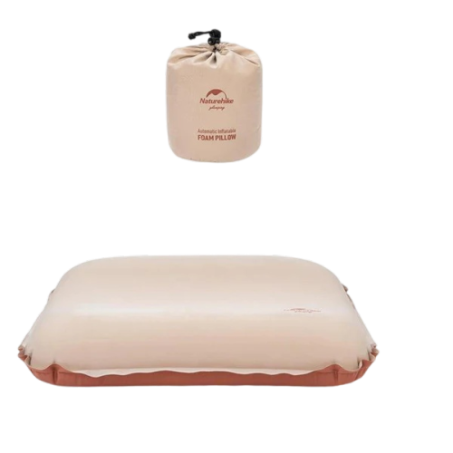Beige inflatable foam pillow with packaging on a white background