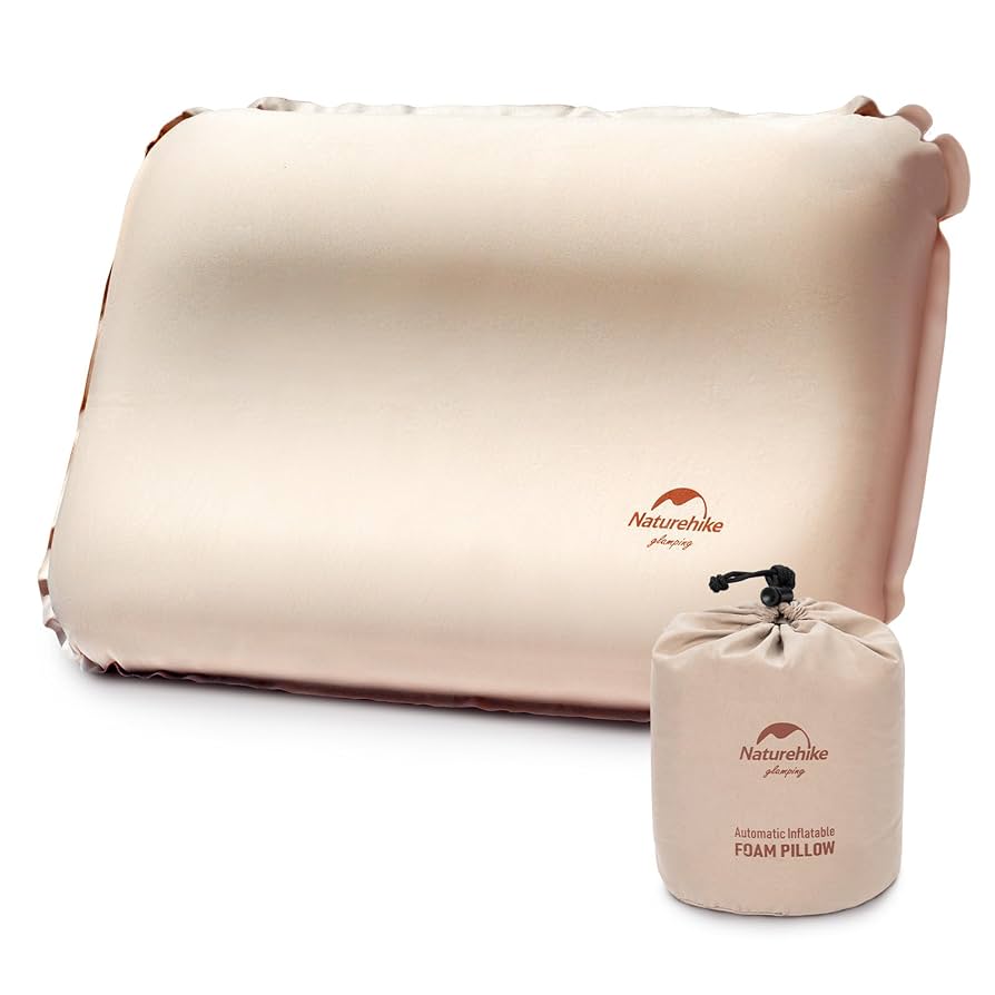 Inflatable foam pillow with carrying bag on a white background, featuring Naturehike branding.