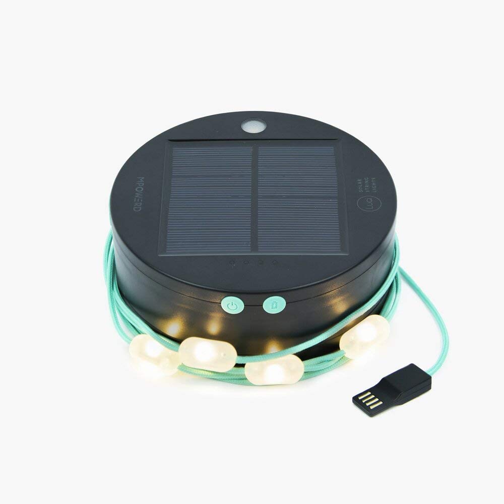 Round solar light with USB cable on a white background