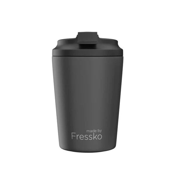 Black tumbler with lid on a white background, branded 'made by Fressko'.