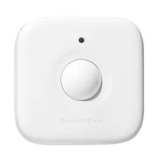 White electronic device with a circular button on a white background