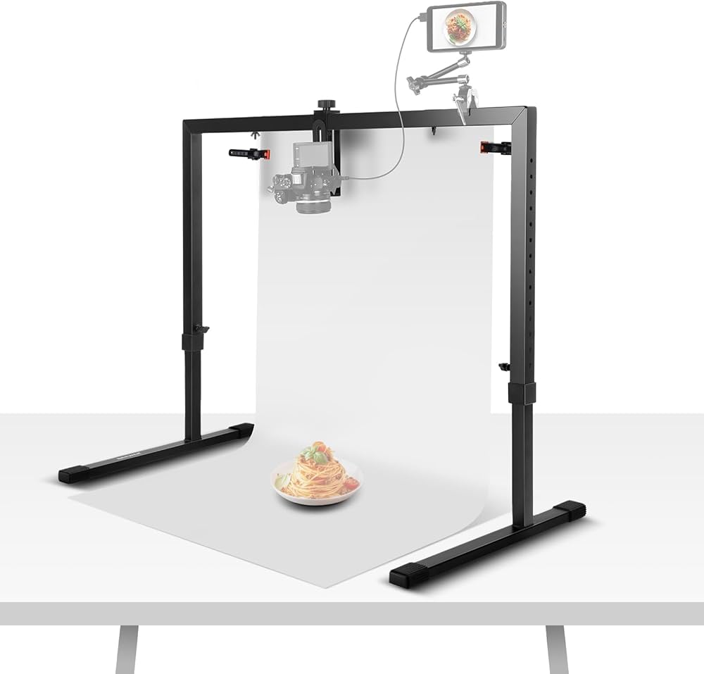 Photography light stand with a camera mounted on a white background