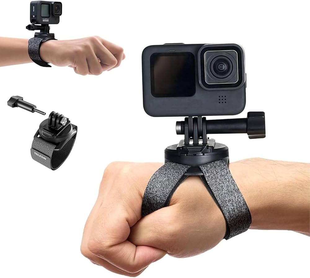 Action camera with wrist strap and additional mount on a white background