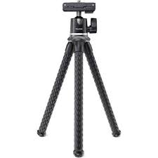Camera tripod on a white background