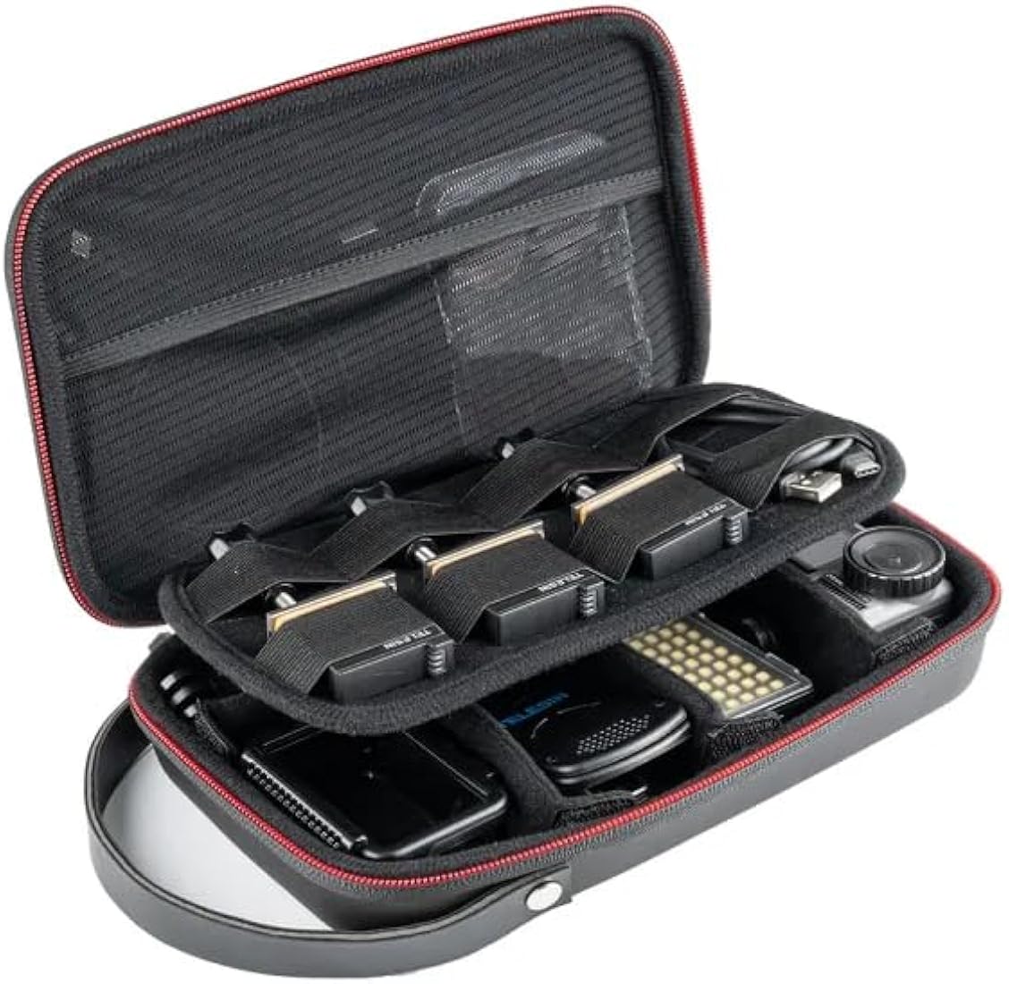 Black travel case with grooming products on a white background