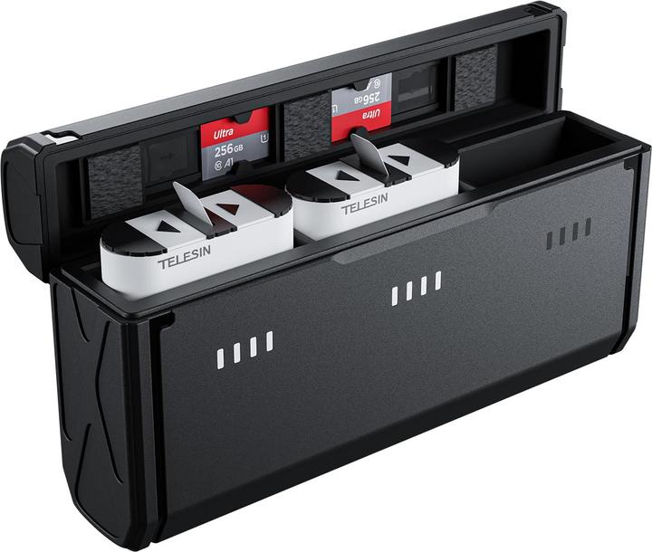 Black storage case with Telesin memory cards and cards readers on a white background