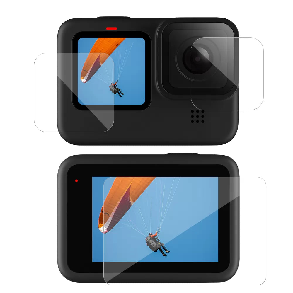 Action camera with screen protector displaying a paragliding scene.