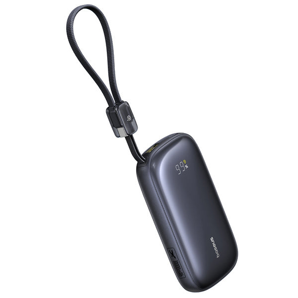 Black power bank with digital display on a white background