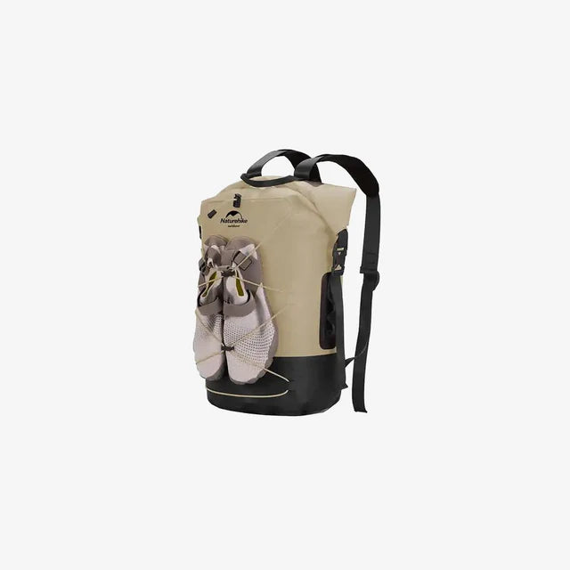 Beige backpack with black straps on a white background