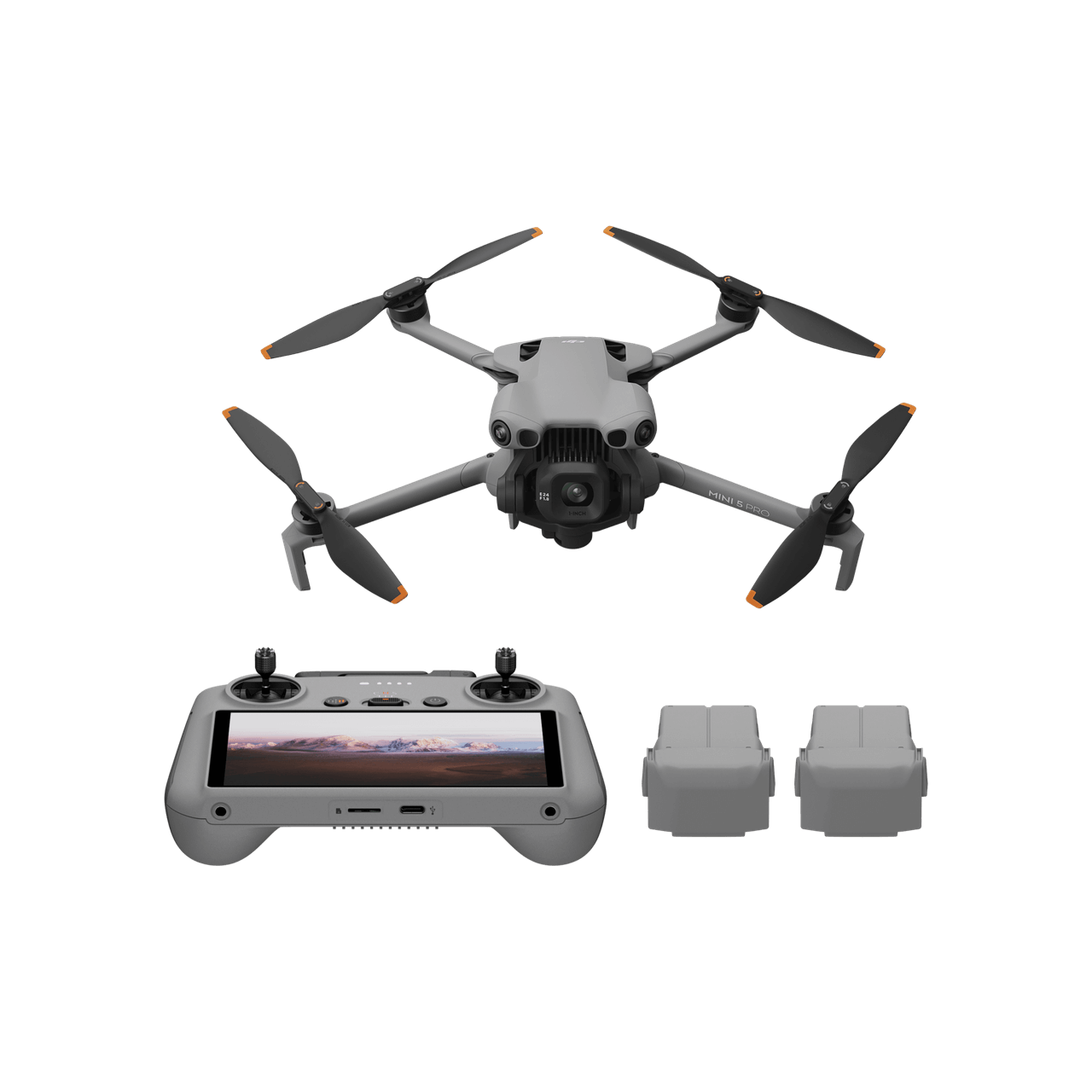 Drone with remote control and batteries on a black background