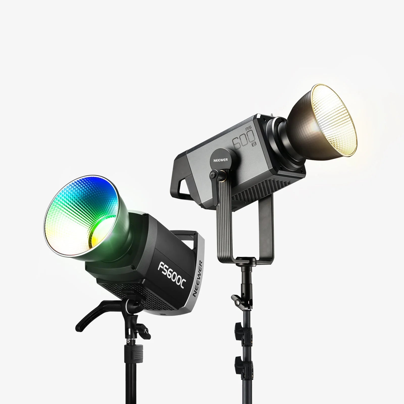 Two studio lights on stands with visible branding on a white background