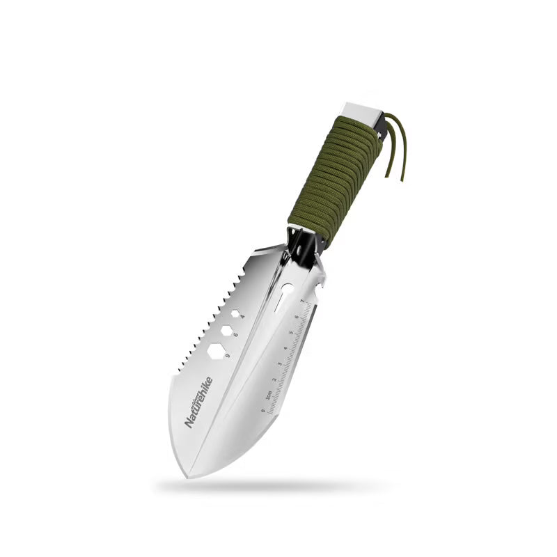 Gardening trowel with green handle on a white background