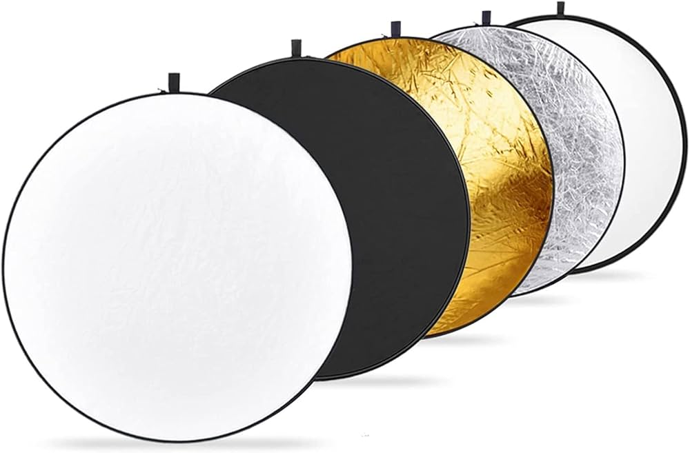 Set of round reflective panels in white, black, gold, silver, and gray on a white background.